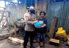 Bhabinkamtibmas-Brigpol-Mohamad-Ijan-Distribusikan-Bansos-Beras-Polri-Kepada-Keluarga-Kurang-Mampu